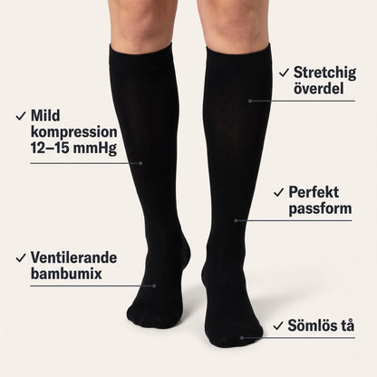 Svarta knähöga stödstrumpor med mild kompression – funktioner