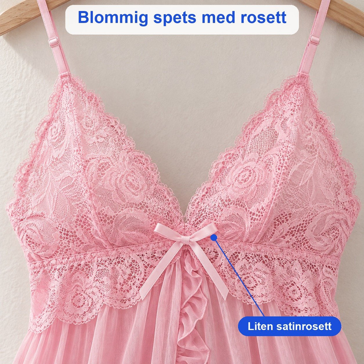 Närbild på rosa spetsöverdel med blommig spets och liten satinrosett