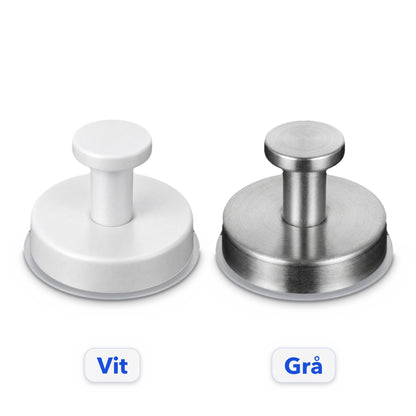 Sugkoppskrokar i vit och grå på vit bakgrund